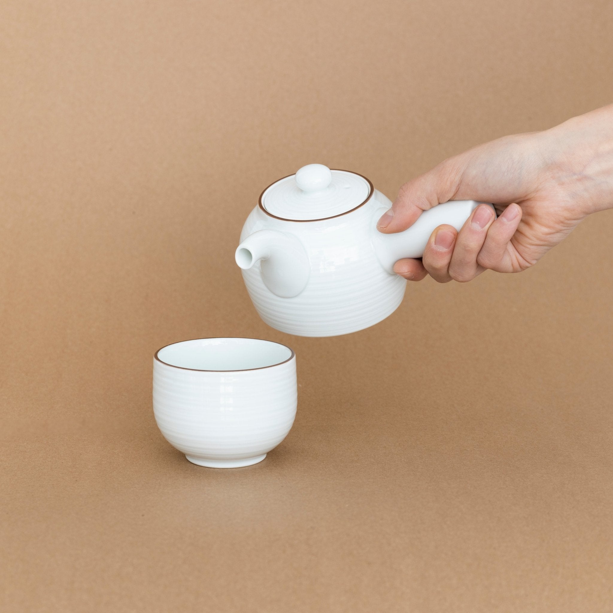 http://shop.tortoisegeneralstore.com/cdn/shop/products/hakusan-porcelain-tea-cup-277539.jpg?v=1696544766