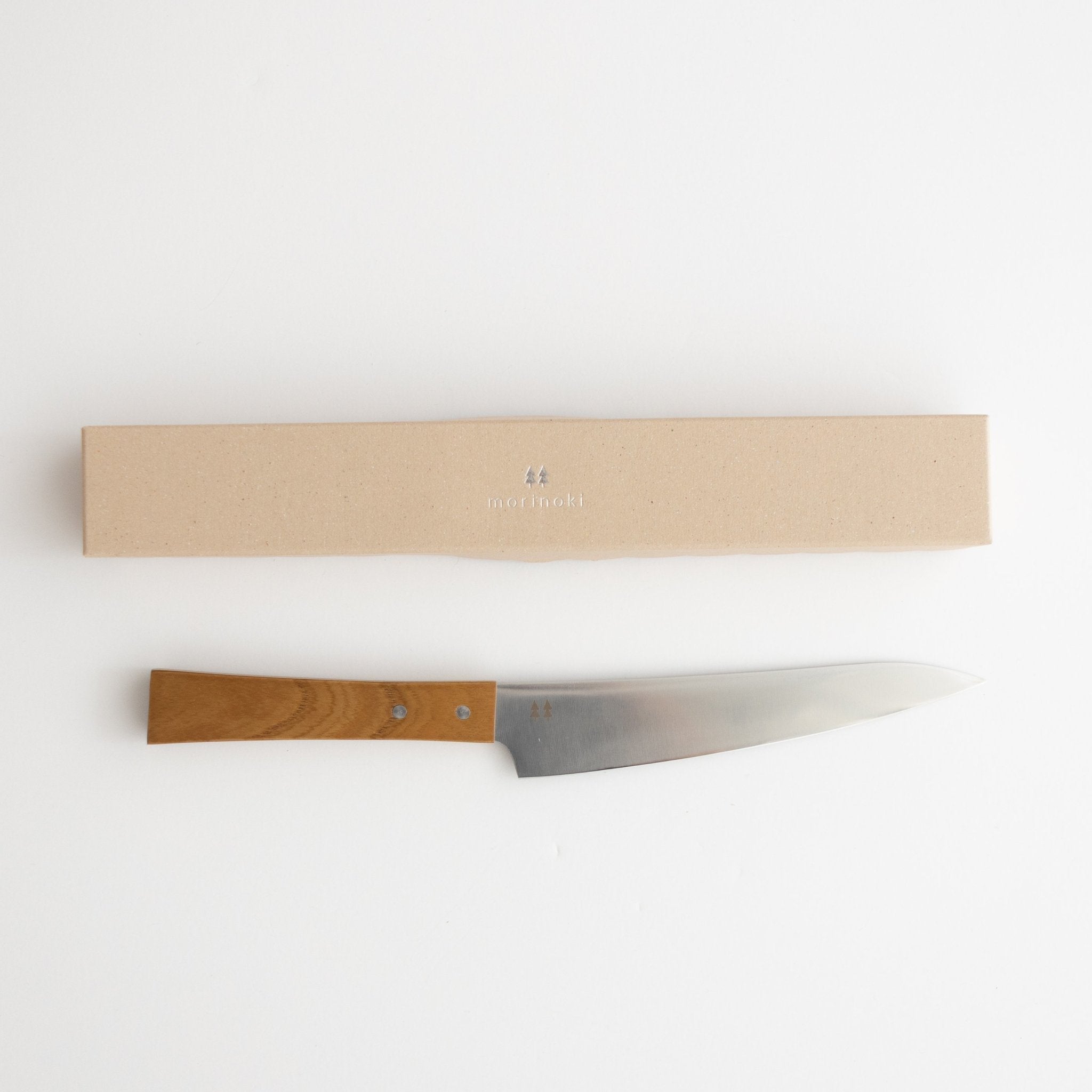 http://shop.tortoisegeneralstore.com/cdn/shop/products/morinoki-general-and-petty-knives-963107.jpg?v=1632884489