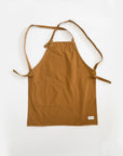 G.K.P Shorter Slip - On Style Apron with fringe finish : Organic Cotton | Tortoise General Store